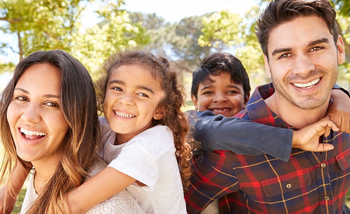 Happy family of four