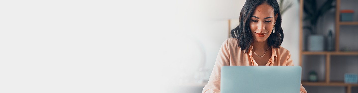 Woman looking at laptop screen